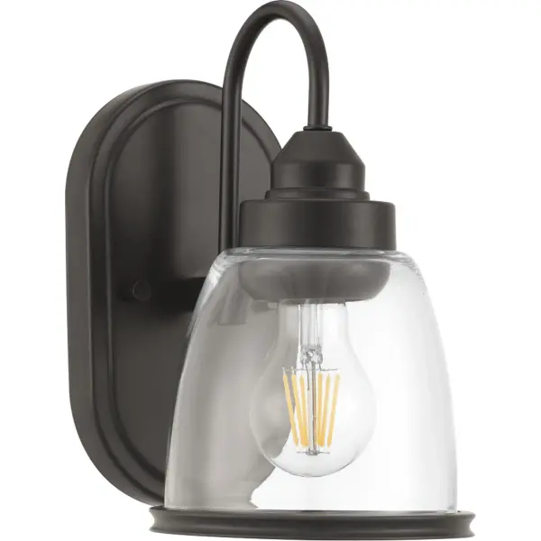 The Saluda bath light brings coastal charm to smaller bathrooms with its brushed nickel finish and clean design. JA8 compliant for California installations, this single-light fixture offers efficient illumination.