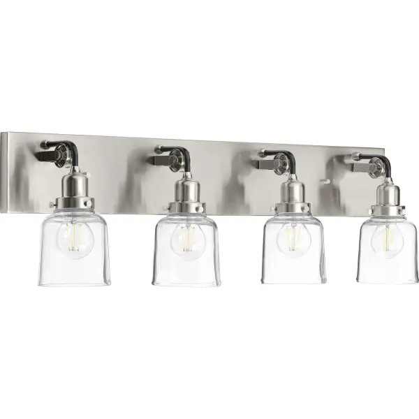 The Rushton vanity light blends rustic farmhouse style with urban industrial elements through clear glass cylinders and brushed nickel finish. Four lights provide excellent illumination for larger vanities while the clean design complements both traditional and contemporary bathrooms.