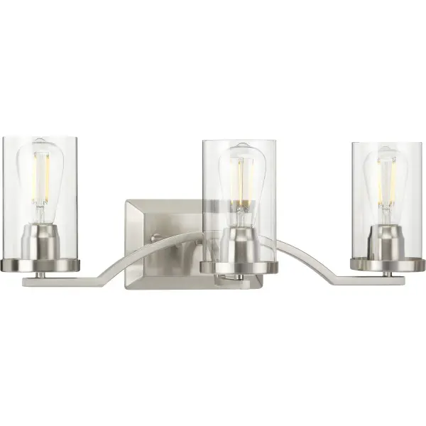 The Lassiter vanity light combines transitional styling with modern functionality. Three clear glass shades provide excellent task lighting while the brushed nickel finish adds sophisticated appeal to any bathroom. - alternate view