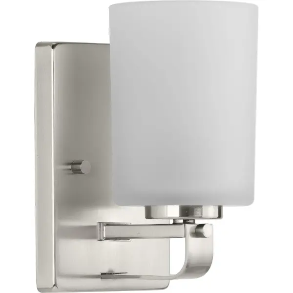 The League Collection brings modern sophistication to bathroom lighting with its brushed nickel finish and etched glass shade. Perfect for contemporary and transitional spaces, this single-light fixture offers clean lines and soft illumination.