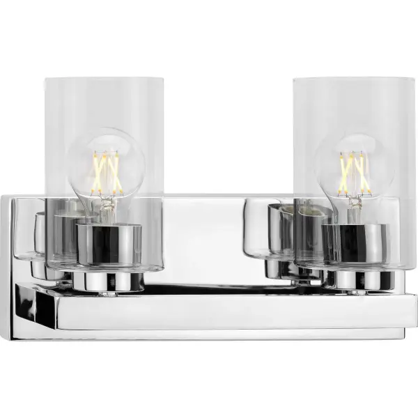 The Goodwin two-light vanity fixture combines brushed nickel finish with clear glass shades for a refined, modern look. Perfect for bathrooms and powder rooms seeking contemporary style with excellent task lighting. - alternate view