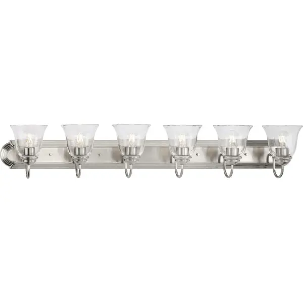 This traditional six-light vanity fixture combines brushed nickel finish with clear glass shades for timeless style and excellent task lighting. Perfect for larger bathrooms requiring ample illumination. - alternate view
