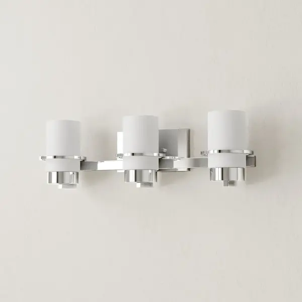The Reiss Collection brings modern farmhouse charm to bathroom lighting with its three-light design and brushed nickel finish. JA8 compliant for California energy standards, this versatile fixture works in residential and commercial settings.