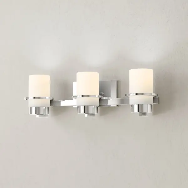 The Reiss Collection brings modern farmhouse charm to bathroom lighting with its three-light design and brushed nickel finish. JA8 compliant for California energy standards, this versatile fixture works in residential and commercial settings. - alternate view