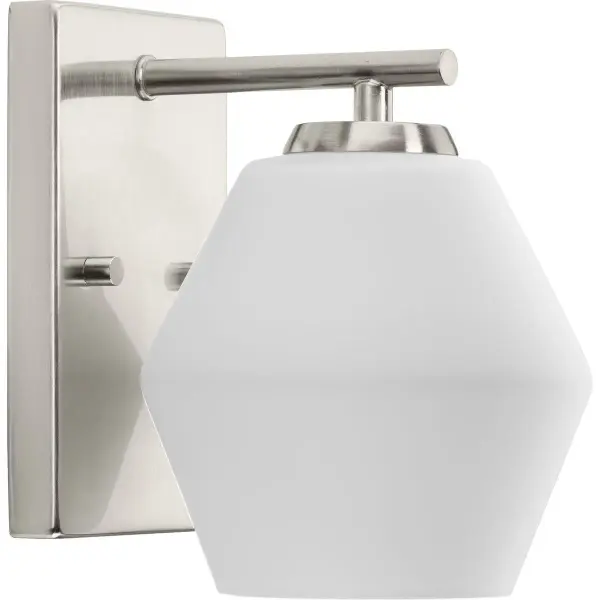 The Copeland vanity light brings clean mid-century styling to bathroom spaces with its brushed nickel finish and glass globe shade. JA8 compliant for California energy standards, this single-light fixture offers versatile appeal.