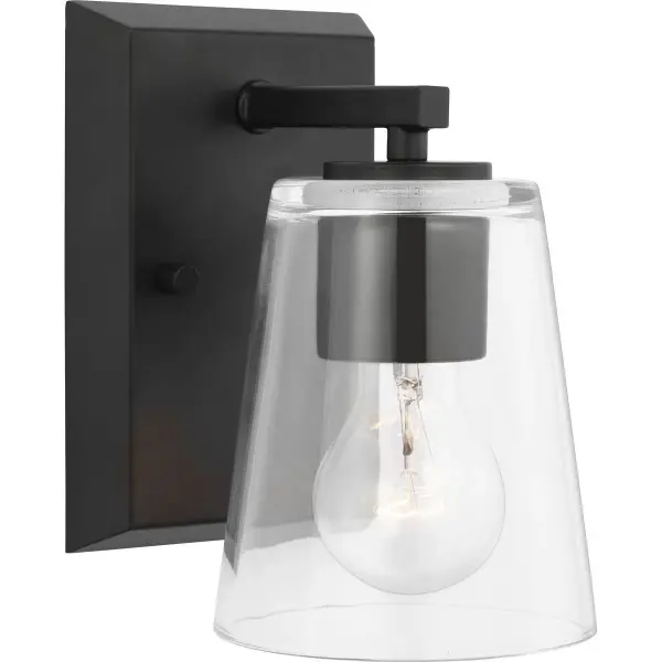 The Vertex bath light combines brushed nickel finish with clear glass for a sleek, contemporary look. Title 24 and JA8 compliant, this single-light fixture offers efficient illumination perfect for modern bathrooms.
