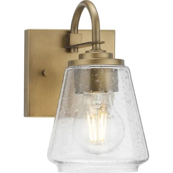 The Martenne vanity light blends rustic farmhouse style with contemporary functionality. Its aged bronze finish and clean lines work beautifully in traditional and transitional bathrooms, offering JA8 and Title 22 compliance. - alternate view