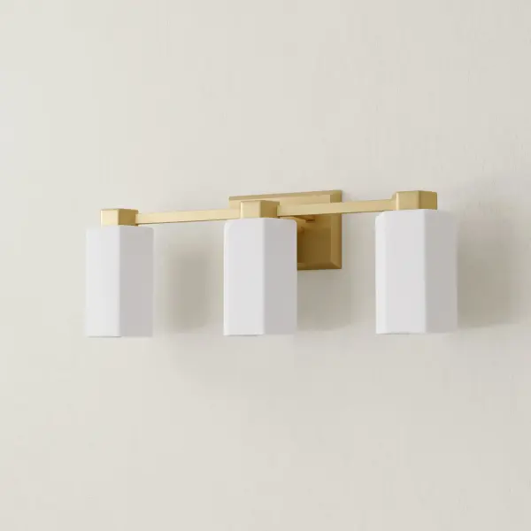 The Estrada three-light vanity fixture combines mid-century modern aesthetics with contemporary functionality. Its polished chrome finish and clean lines make it ideal for modern bathrooms seeking sophisticated illumination.