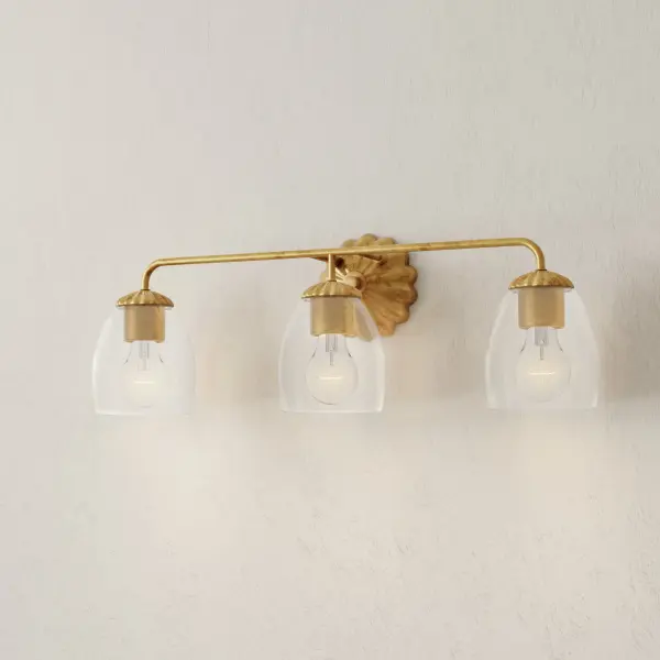 The Quillan three-light vanity fixture brings a sophisticated organic aesthetic to bathroom spaces with its textured white plaster finish and clean transitional design. Perfect for modern and transitional interiors seeking refined simplicity. - alternate view
