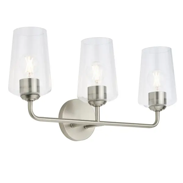 The Celino three-light vanity fixture combines brushed nickel finish with glass shades for a timeless look that complements both traditional and contemporary bathrooms. Ideal for medium-sized vanities.