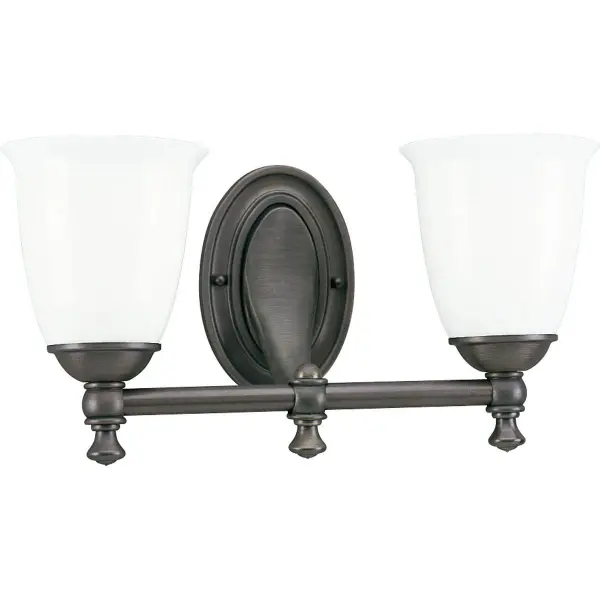This two-light vanity fixture combines timeless Victorian elegance with farmhouse simplicity. White opal glass shades provide soft, even illumination while the brushed nickel finish adds contemporary appeal. - alternate view
