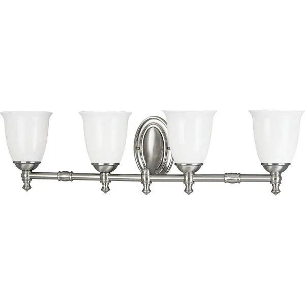 This four-light vanity fixture combines timeless Victorian design with contemporary brushed nickel finish and white opal glass shades. Perfect for medium to large bathrooms seeking traditional charm with ample illumination.