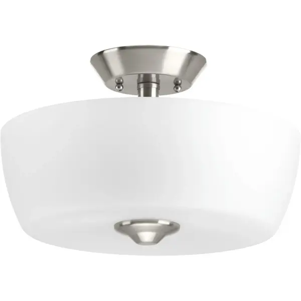 The Leap Collection offers a sleek, modern two-light semi-flush mount perfect for bedrooms, hallways, and foyers with standard ceiling heights. Its brushed nickel finish and 14-inch profile deliver contemporary style without overwhelming smaller spaces.