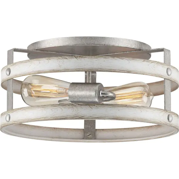 The Gulliver flush mount brings rustic industrial character to low-ceiling spaces with its galvanized metal finish. Perfect for bedrooms, hallways, and foyers where ceiling clearance is limited.