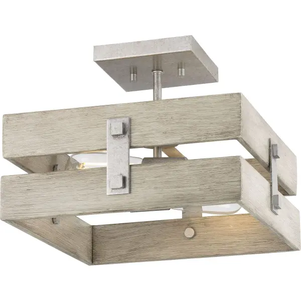 The Hemsworth semi-flush mount brings weathered coastal character to low-ceiling spaces. Its compact 13.5-inch profile and galvanized finish deliver rustic charm perfect for bedrooms, hallways, and foyers.
