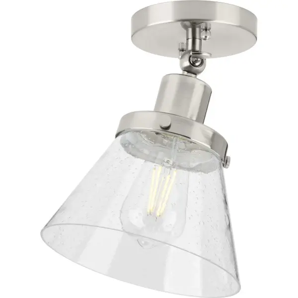 The Hinton Collection brings timeless elegance to compact spaces with its polished nickel finish and distinctive seeded glass shade. Perfect for hallways, bedrooms, and foyers where ceiling clearance is limited.