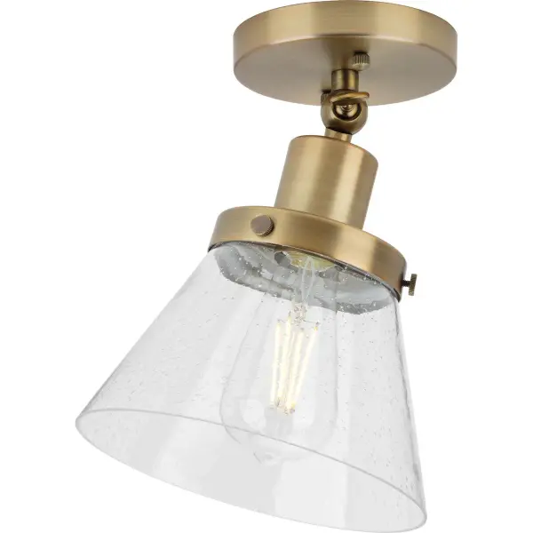 The Hinton Collection brings timeless elegance to compact spaces with its polished nickel finish and distinctive seeded glass shade. Perfect for hallways, bedrooms, and foyers where ceiling clearance is limited. - alternate view