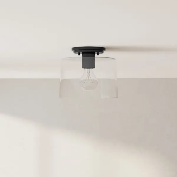 The Adley flush mount combines modern farmhouse charm with transitional versatility. Its clear glass shade and brushed nickel finish create a clean, sophisticated look perfect for low-ceiling spaces.