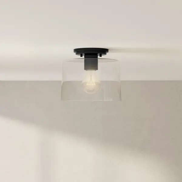 The Adley flush mount combines modern farmhouse charm with transitional versatility. Its clear glass shade and brushed nickel finish create a clean, sophisticated look perfect for low-ceiling spaces. - alternate view