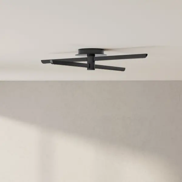 The Pivot LED fixture delivers contemporary style with energy-efficient LED technology. Its four-light design provides ample illumination while the matte black finish adds modern sophistication to any space. - alternate view