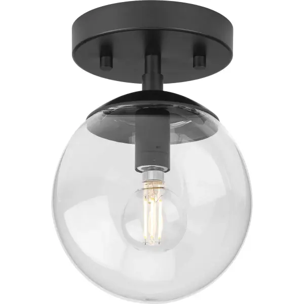 The Atwell semi-flush mount delivers clean mid-century styling with a brushed nickel finish and glass shade. Its compact profile makes it ideal for bedrooms, hallways, and foyers with standard ceiling heights. - alternate view