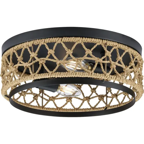 The Chandra flush mount blends transitional elegance with coastal charm through its handcrafted woven shade and matte black finish. Perfect for low-ceiling spaces needing ambient lighting with organic texture.