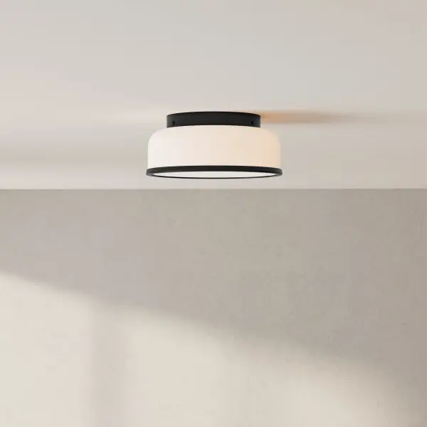 The Parkhurst flush mount combines clean contemporary lines with transitional warmth, making it ideal for bedrooms, hallways, and foyers. Its compact 11-1/4" profile fits low ceilings while providing ample two-light illumination. - alternate view