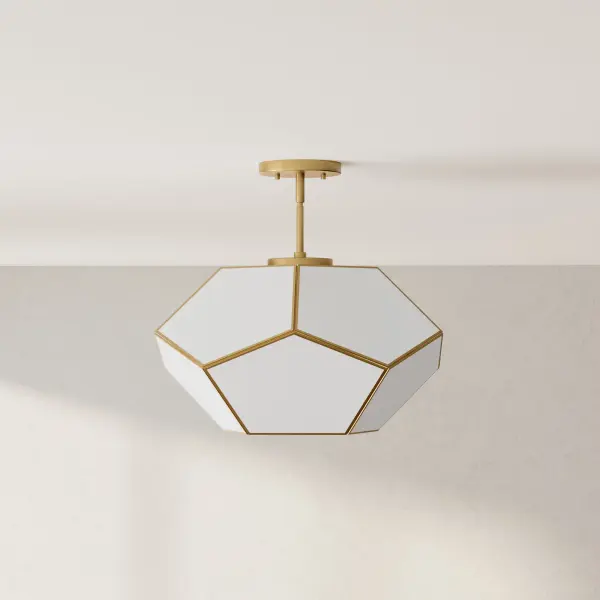 The Latham flush mount brings industrial-inspired design to spaces with lower ceilings. Its 18-inch diameter and three-light configuration provide ample illumination while the brushed nickel finish adds contemporary sophistication.