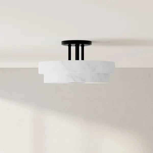 The Tosca semi-flush mount delivers contemporary style with a brushed bronze finish, perfect for rooms with standard ceiling heights. Three lights provide ample illumination while maintaining a sleek, close-to-ceiling profile.