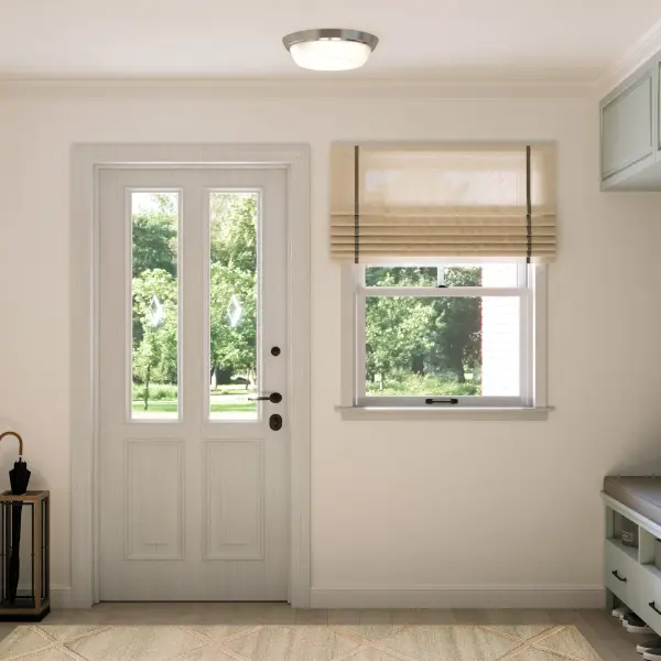 The Edessa flush mount combines clean lines with a brushed nickel finish, making it ideal for modern spaces with limited ceiling clearance. Its low-profile design provides ample illumination without sacrificing style. - alternate view