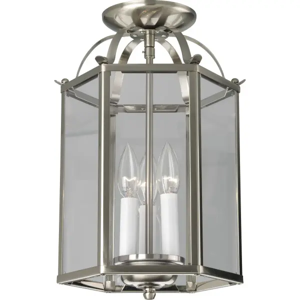 This traditional foyer pendant features three lights housed in elegant flat glass panels with a brushed nickel finish. Perfect for entryways and dining spaces, it provides ample illumination while maintaining a refined aesthetic.