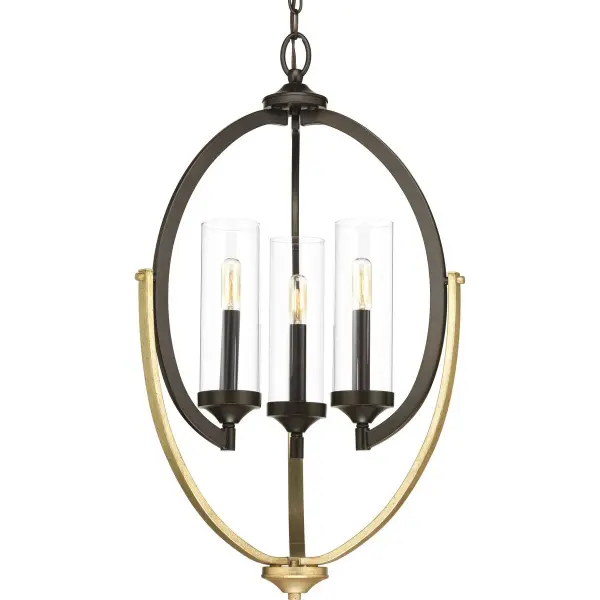 The Evoke chandelier combines classic clear glass shades with an antique bronze finish for versatile appeal. Its compact three-light design provides ample illumination for intimate spaces while maintaining an airy, unobtrusive presence. - alternate view