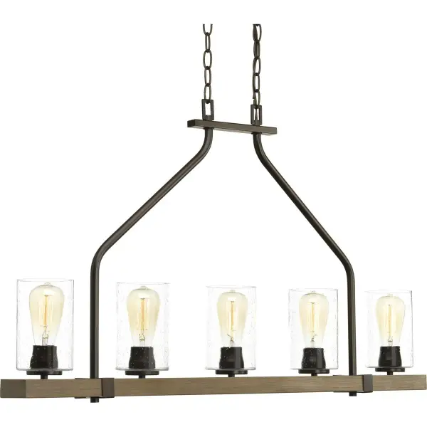 The Barnes Mill linear chandelier brings authentic farmhouse charm with its five-light design and antique bronze finish. Perfect for kitchen islands and dining tables, this fixture combines rustic character with practical illumination.