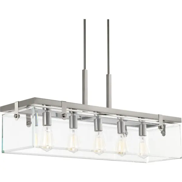 The Glayse linear chandelier combines contemporary styling with timeless clear glass shades and brushed nickel finish. Five lights provide ample illumination for dining and kitchen spaces while the linear form creates visual balance.