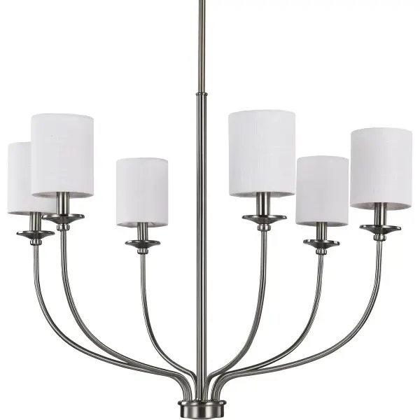 The Bonita chandelier combines polished chrome hardware with soft white linen shades for sophisticated illumination. Six lights provide ample brightness while fabric shades diffuse light beautifully for dining and living spaces.