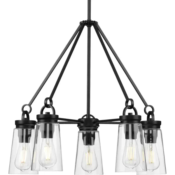 The Stockbrace chandelier combines rustic farmhouse charm with modern industrial design. Five clear glass shades on a black metal frame create a striking focal point perfect for dining spaces and kitchen islands.