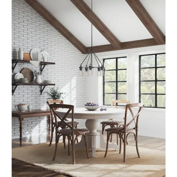 The Stockbrace chandelier combines rustic farmhouse charm with modern industrial design. Five clear glass shades on a black metal frame create a striking focal point perfect for dining spaces and kitchen islands. - alternate view