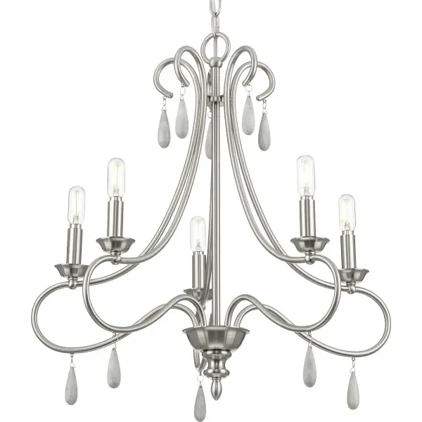 The Vinings five-light chandelier blends transitional elegance with farmhouse warmth in a brushed nickel finish. Its versatile design works beautifully in dining rooms, kitchens, and bedrooms, offering ample illumination with coastal-inspired style.