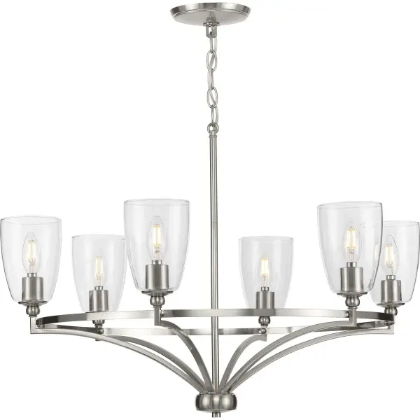 The Parkhurst chandelier combines transitional styling with farmhouse charm, featuring six lights and clear glass shades in a brushed nickel finish. Its versatile design works beautifully in dining rooms, kitchens, and bedrooms.