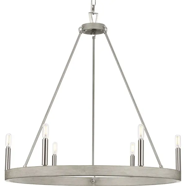 The Galloway six-light chandelier combines coastal charm with modern farmhouse style in a 28.25-inch design. Its brushed nickel finish and clean lines make it adaptable to various interior styles while providing ample illumination.
