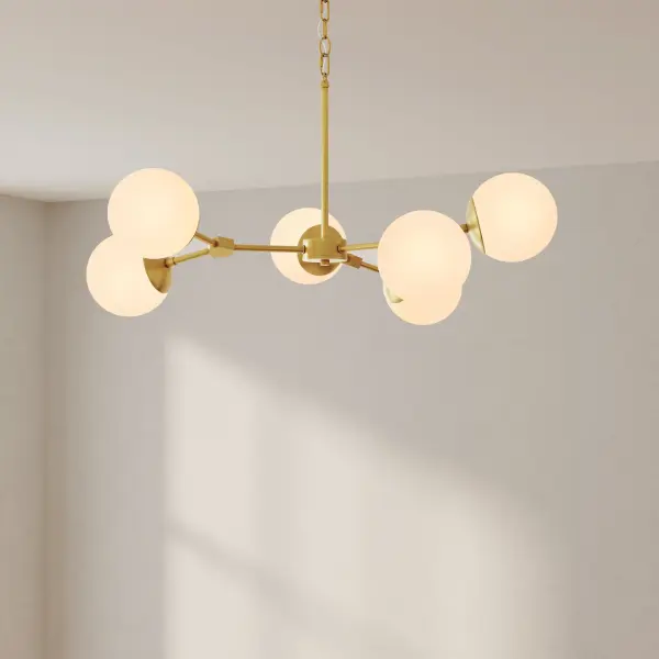 The Haas Collection chandelier brings authentic mid-century modern style with its clean lines and brushed nickel finish. Six lights provide excellent illumination for dining and kitchen spaces while maintaining an elegant, uncluttered aesthetic. - alternate view