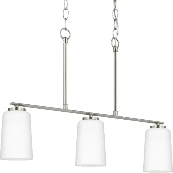 The Adley linear chandelier combines brushed nickel hardware with etched white glass shades for a refined look that works in both traditional and contemporary spaces. Three lights provide ample illumination for kitchen islands and dining tables.