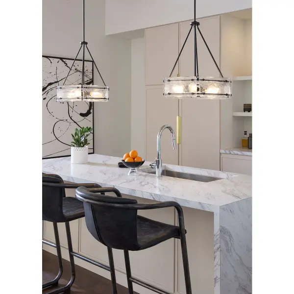 The Rivera Collection brings sophisticated farmhouse style with a four-light design in matte black. Perfect for dining spaces and kitchen islands, this chandelier balances rustic charm with contemporary clean lines. - alternate view