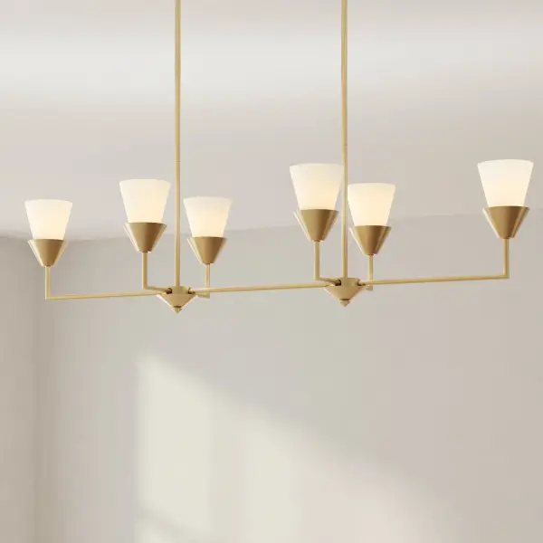 The Pinellas six-light linear chandelier brings sophisticated coastal elegance with its white plaster finish. Perfect for kitchen islands and dining rooms, this fixture combines traditional craftsmanship with versatile styling. - alternate view