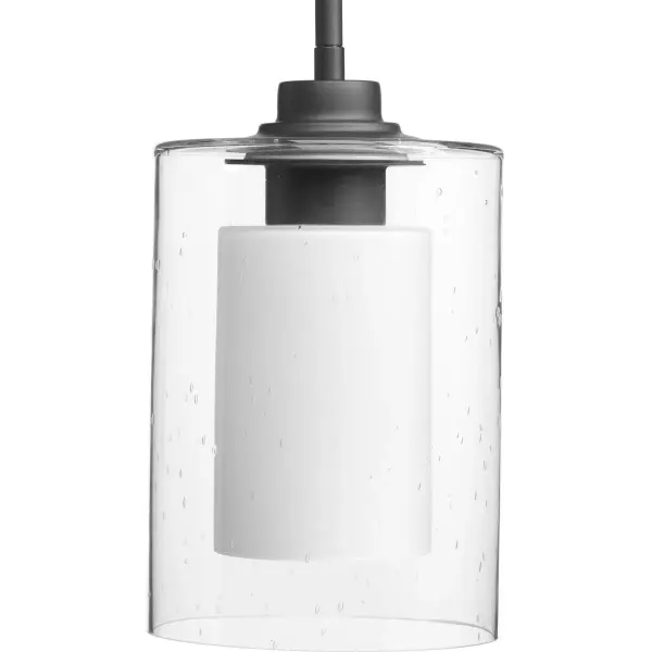 This single-light pendant features a distinctive double-glass design with etched white interior and seeded exterior, creating beautiful light diffusion. The polished chrome finish adds contemporary elegance to farmhouse styling. - alternate view