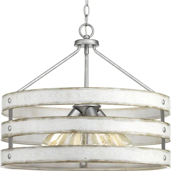 The Gulliver pendant brings nautical charm with its galvanized metal finish and four-light configuration. Perfect for kitchen islands and dining areas, this fixture combines coastal style with farmhouse appeal.