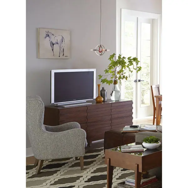 The Fermi pendant offers clean, modern styling in a durable brushed nickel finish. Its three-light configuration provides excellent illumination for dining and kitchen spaces while maintaining a sleek profile. - alternate view