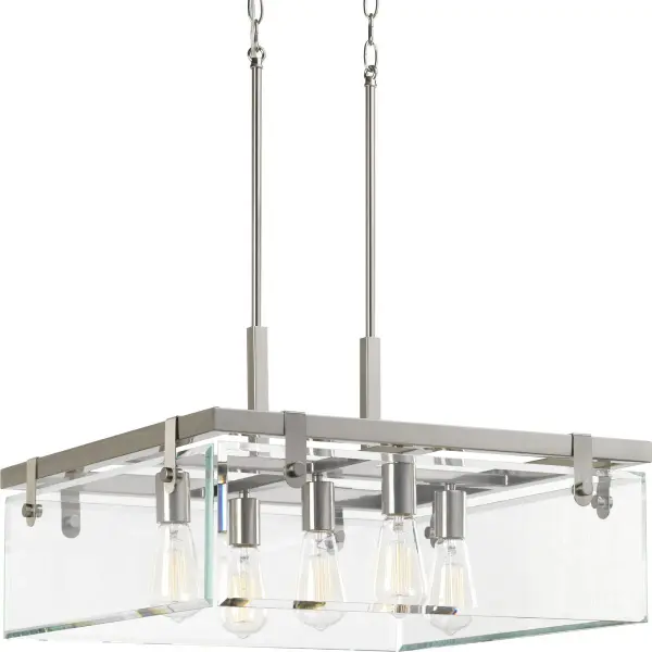 The Glayse Collection brings contemporary elegance with five clear glass globes suspended from a brushed nickel frame. This statement pendant combines luxe design with versatile styling, perfect for modern dining rooms and kitchen islands.