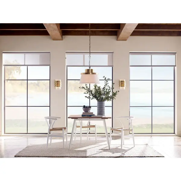 The Point Dume Windbluff pendant brings sophisticated coastal style to any space with its brushed brass finish. Part of a designer series, it blends modern and transitional elements for versatile appeal in residential settings. - alternate view