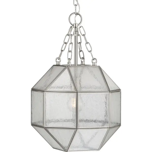 The Mauldin pendant combines classic seeded glass texture with brushed nickel finish for a versatile look that works in traditional and contemporary spaces. Perfect for kitchen islands or dining areas.